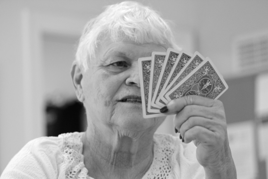 Julie Ogden considers her cards during the card game at the Senior Resource Center, Inc. [John-Henry Doucette/The Princess Anne Independent News]