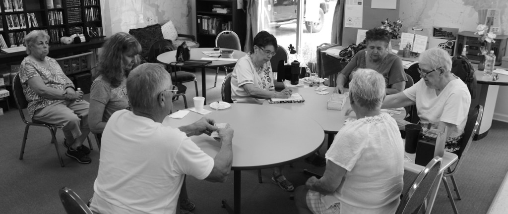 The whole group of players during a recent visit to the center —and, to the left of the players, Patty Holmes, the cheering section. [John-Henry Doucette/The Princess Anne Independent News]