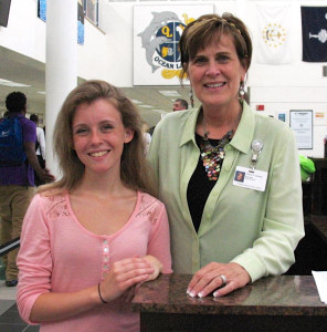 Kayla Iazzetta and Ocean  Lakes  High School Principal Cheryl Askew are shown at the school. [Janet Yarbrough Meyer/The Princess Anne Independent News]