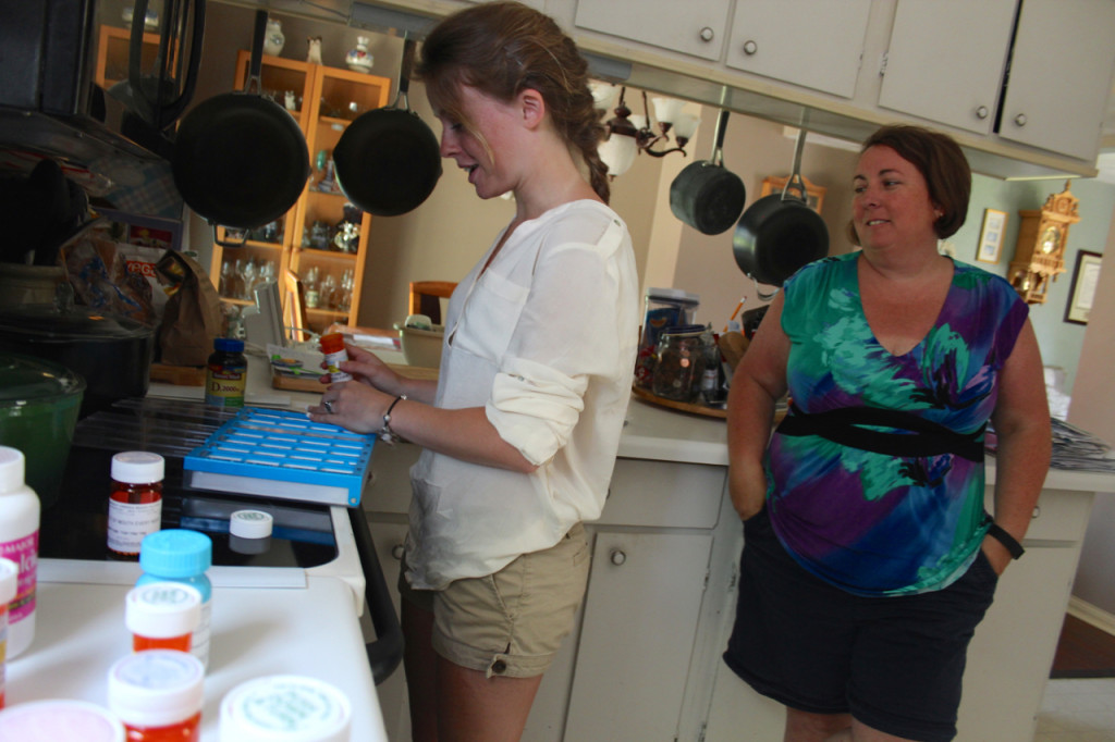 Kayla Iazzetta’s schedule includes keeping track of a number of medications, a procss she needs to know backwards and forwards. Her mom, Tara Copeland, even prepared a chart of her medications complete with photos. [John-Henry Doucette/The Princess Anne Independent News]