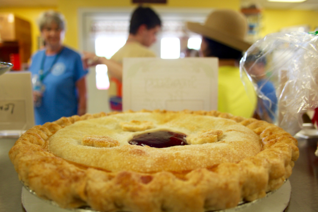 A strawberry pie rests on the counter, tempting customers of Seasons Best Bakery at the Virginia Beach Farmers Market. [John-Henry Doucette/The Princess Anne Independent News]