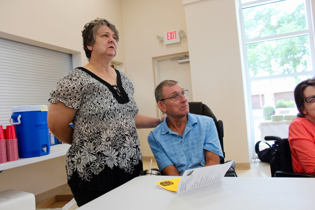 Sylvia Brown and Edmond Turner, visit Oak Grove Baptist Church during its special service in the new building. Turner is friends with Roseanne Ray, a member of the church, and Brown is Turner’s caretaker. They were among a number of friends and guests who joined Oak Grove for the service. [John-Henry Doucette/The Princess Anne Independent News]
