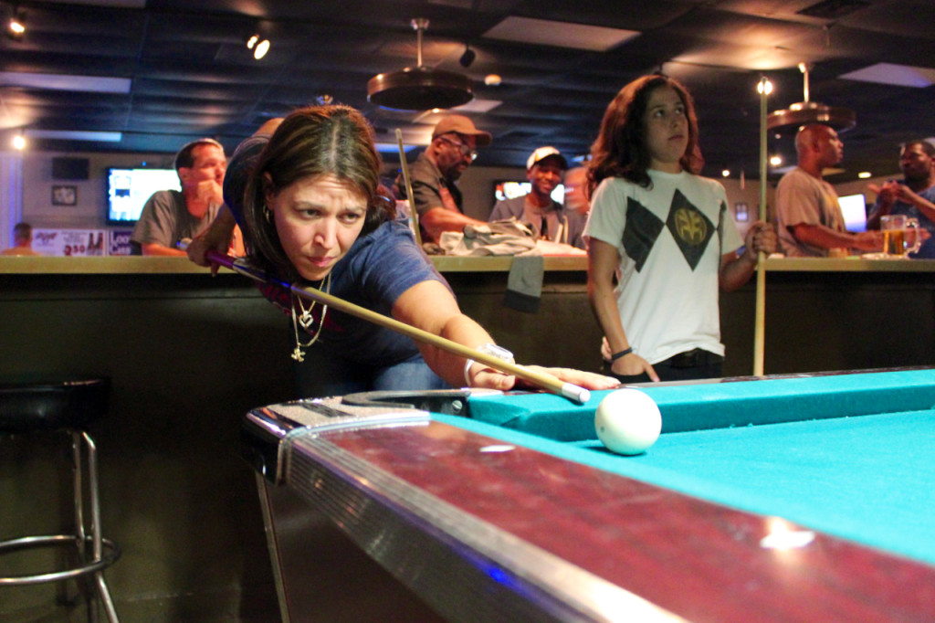Jennifer Giampa of Aragona lines up a shot early in the Friday night pool tournament at Mike’s Break Room in the Landstown area. [John-Henry Doucette/The Princess Anne Independent News]