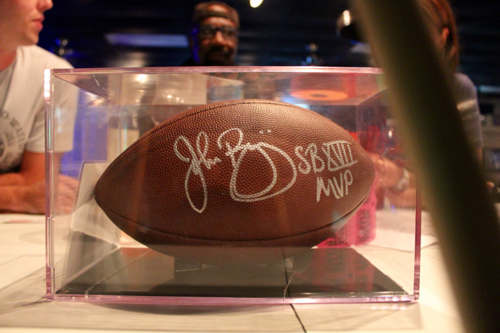 This football autographed by John Riggins is being auctioned off for charity at Mike's Pool Room until the first week of the season. [The Princess Anne Independent News]