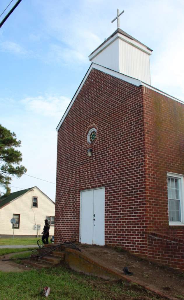 Debris and damage was seen at Asbury Christian Fellowship Church on Princess Anne Road in Virginia Beach following a single-car crash on Tuesday, Sept. 29, 2015. [John-Henry Doucette/The Princess Anne Independent News]
