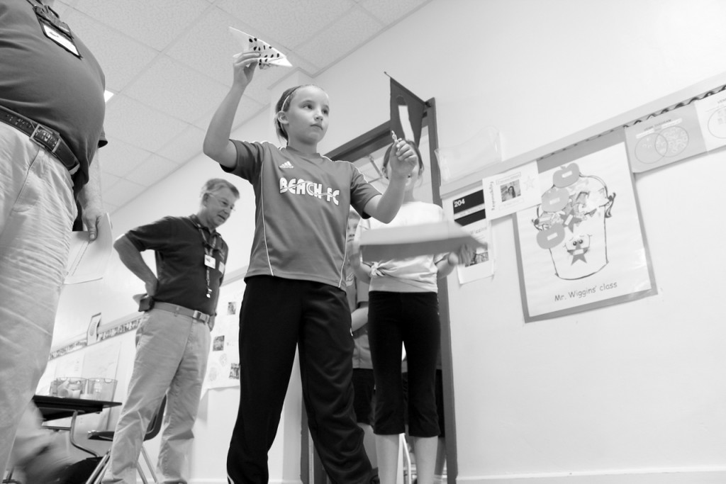 Ava Simon, 10, of Pungo, tests her aircraft. [John-Henry Doucette/The Princess Anne Independent News]