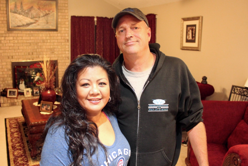 Millette and Mark Keske in their Blackwater home. The couple, with the help of the nearby Blackwater Trading Post, for years have prepared free Thanksgiving meals for  those in the surrounding community who sign up for it. [John-Henry Doucette/The Princess Anne Independent News]