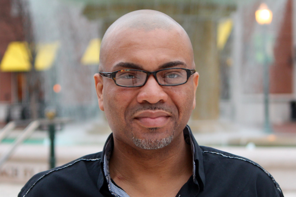The writer Rashod Ollison, photographed at Town Center. [John-Henry Doucette/The Princess Anne Independent News]
