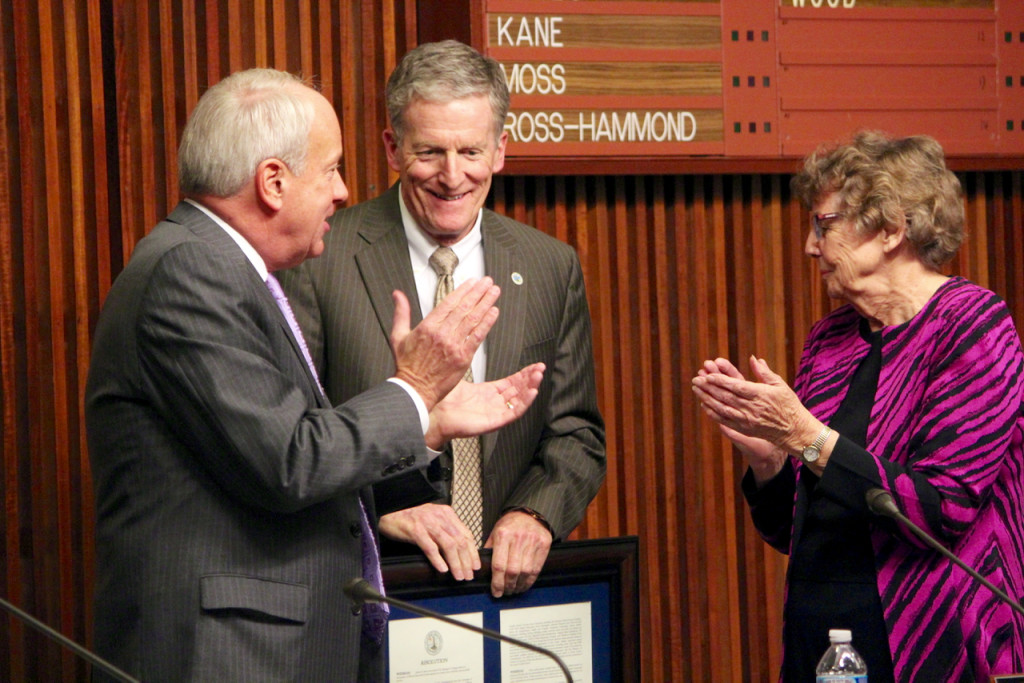 Virginia Beach Mayor Will Sessoms and City Councilmember Barbara Henley applaud City Manager Jim Spore during a meeting on Tuesday, Dec. 8, at City Hall. It was Spore’s last meeting as manager, a position he has held for 24 years.  [John-Henry Doucette/The Princess Anne Independent News]