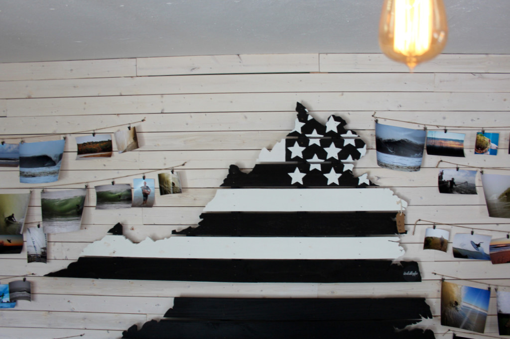 Artwork and photos at The Tar Roof. [John-Henry Doucette/The Princess Anne Independent News]