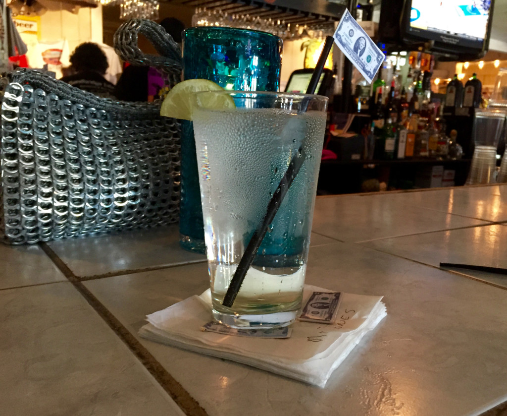 A drink for Dick Jones waited at his normal spot at Sandbridge Island Restaurant during the gathering last month. [John-Henry Doucette/The Princess Anne Independent News]