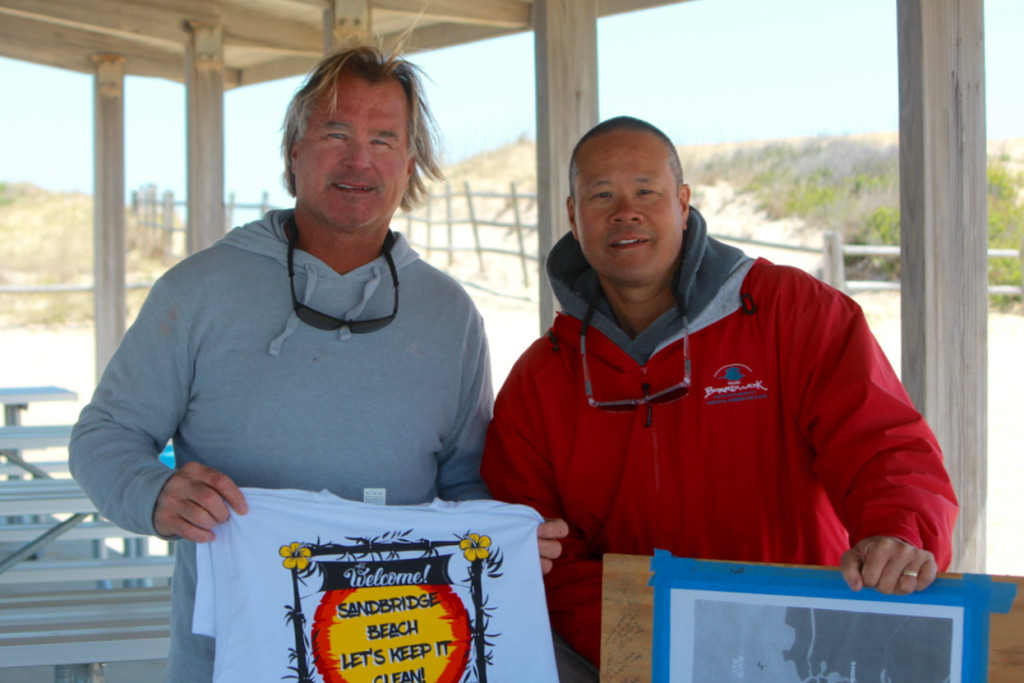 James Barton and Kevin Wong have organized the cleanup effort in Sandbridge for years. [John-Henry Doucette]