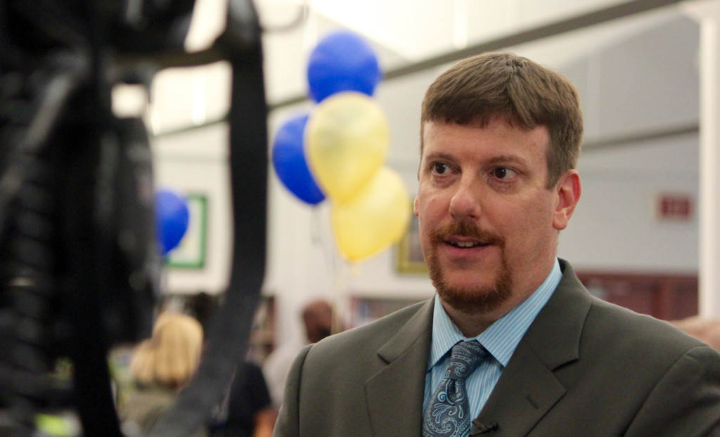 Dr. Alex Bergren, principal of Princess Anne Middle School, is interviewed on Tuesday, May 3, following a gathering to celebrate the school’s recognition as a National School to Watch. He credited educators, parents, students and community partners. [John-Henry Doucette/The Princess Anne Independent News]