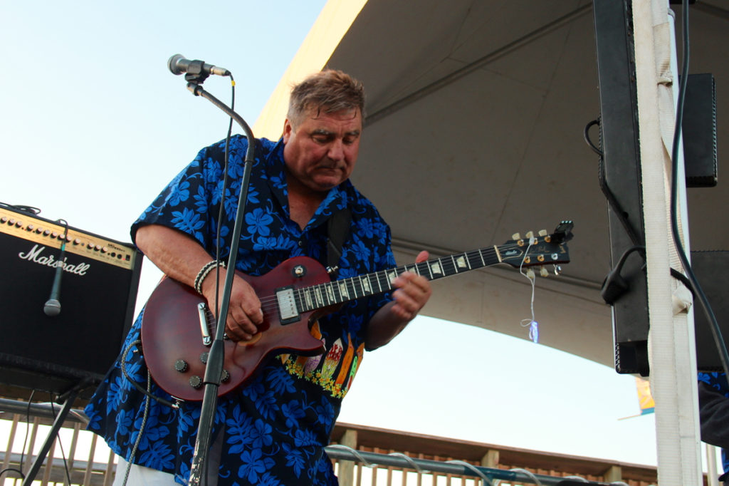 Edgar Justus of The Rhondels plays during the Party at the Pier in Sandbridge. [John-Henry Doucette/The Princess Anne Independent News]