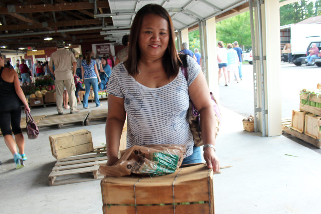 Jean Van Alstyne of Green Run, a regular at the auction, says she bids upon whatever catches her eye. [John-Henry Doucette/The Princess Anne Independent News]