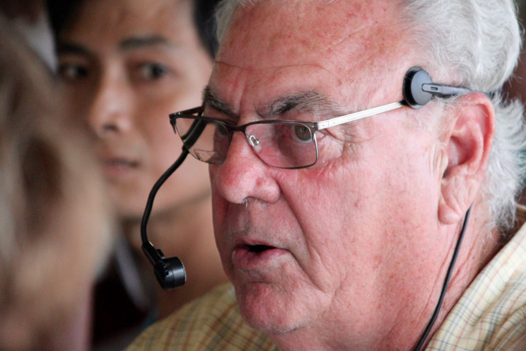 Auctioneer Gene Daniels keeps the produce auction moving along. [John-Henry Doucette/The Princess Anne Independent News]