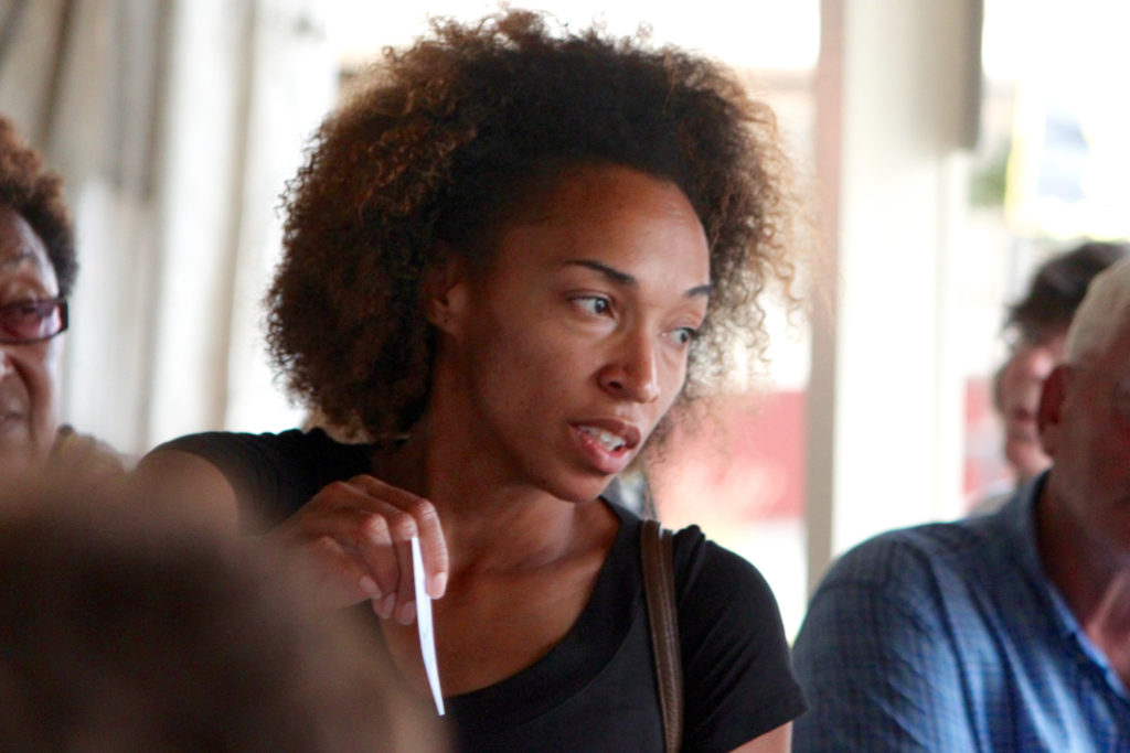 Kimberly Arnold was among the many bidders at a produce auction on Wednesday, July 13, at the Virginia Beach Farmers Market at Princess Anne and Dam Neck roads. [John-Henry Doucette/The Princess Anne Independent News]