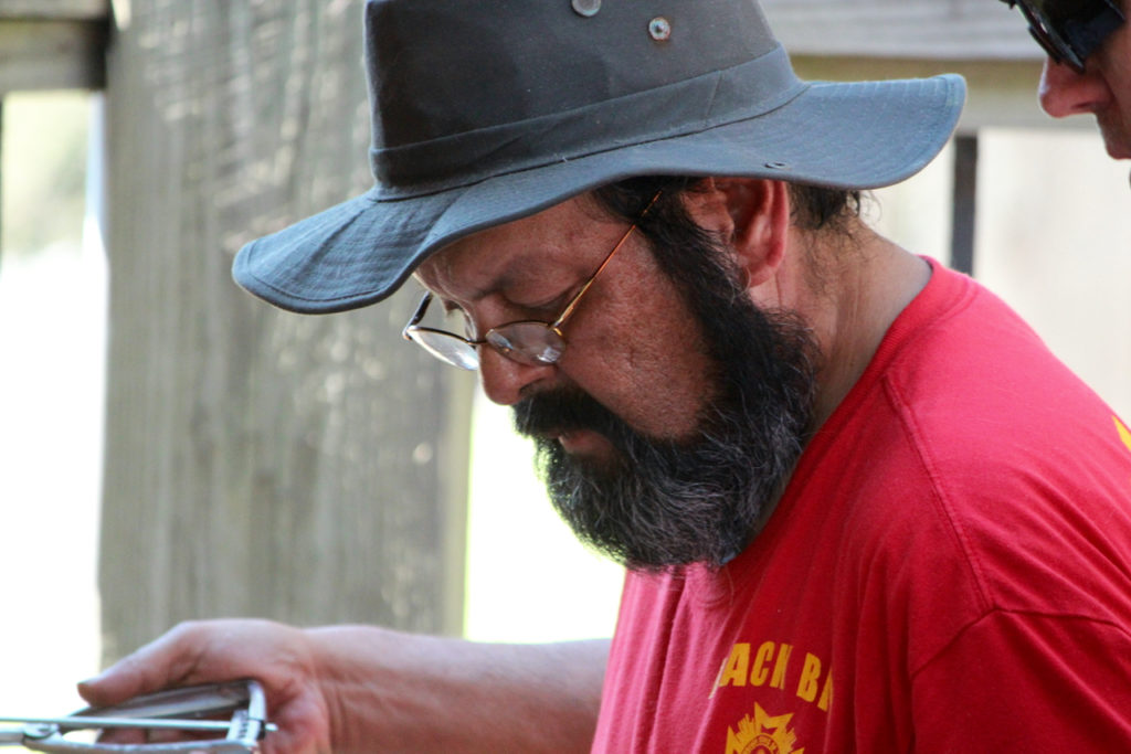 Gil Garcia of Red Mill makes hushpuppies during the fish fry fundraising event for the Veterans of Foreign Wars Back Bay Post 1211 held at the Creeds Ruritan Barn. Garcia served in the Navy, and he is the quartermaster for the VFW post. [John-Henry Doucette/The Princess Anne Independent News]