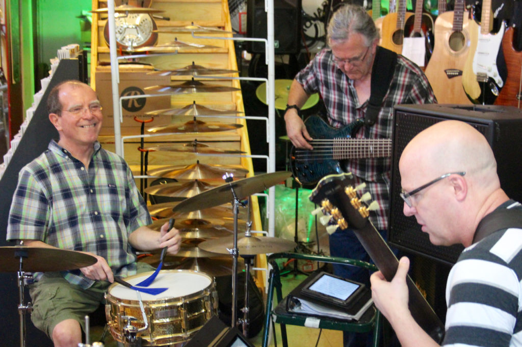 Simpson met and played with Scarborough and Hufstadler for the first time on Friday, Aug. 12, at Russell’s Music World in the Ghent neighborhood of Norfolk. Within a few songs, Scarborough was already planning out gigs with the recent arrival to Virginia Beach. [John-Henry Doucette/The Princess Anne Independent News]