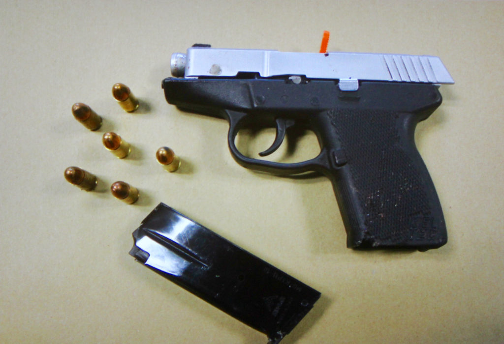 A stolen handgun used in a shootout between police and Angelo Perry in December had been stolen during an earlier robbery in Virginia Beach, according to police. The gun was linked to two homicides and other violent crimes. [Virginia Beach Police Department/Courtesy]